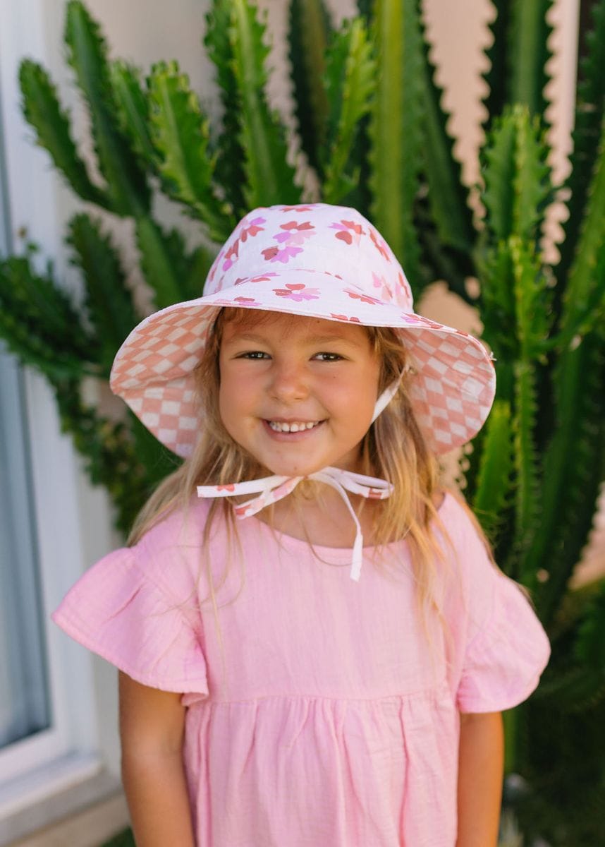 Coral Bloom reversible wide brim sunhat for kids, stylish accessory by Acorn Kids with protective wide brim and vibrant coral pattern.