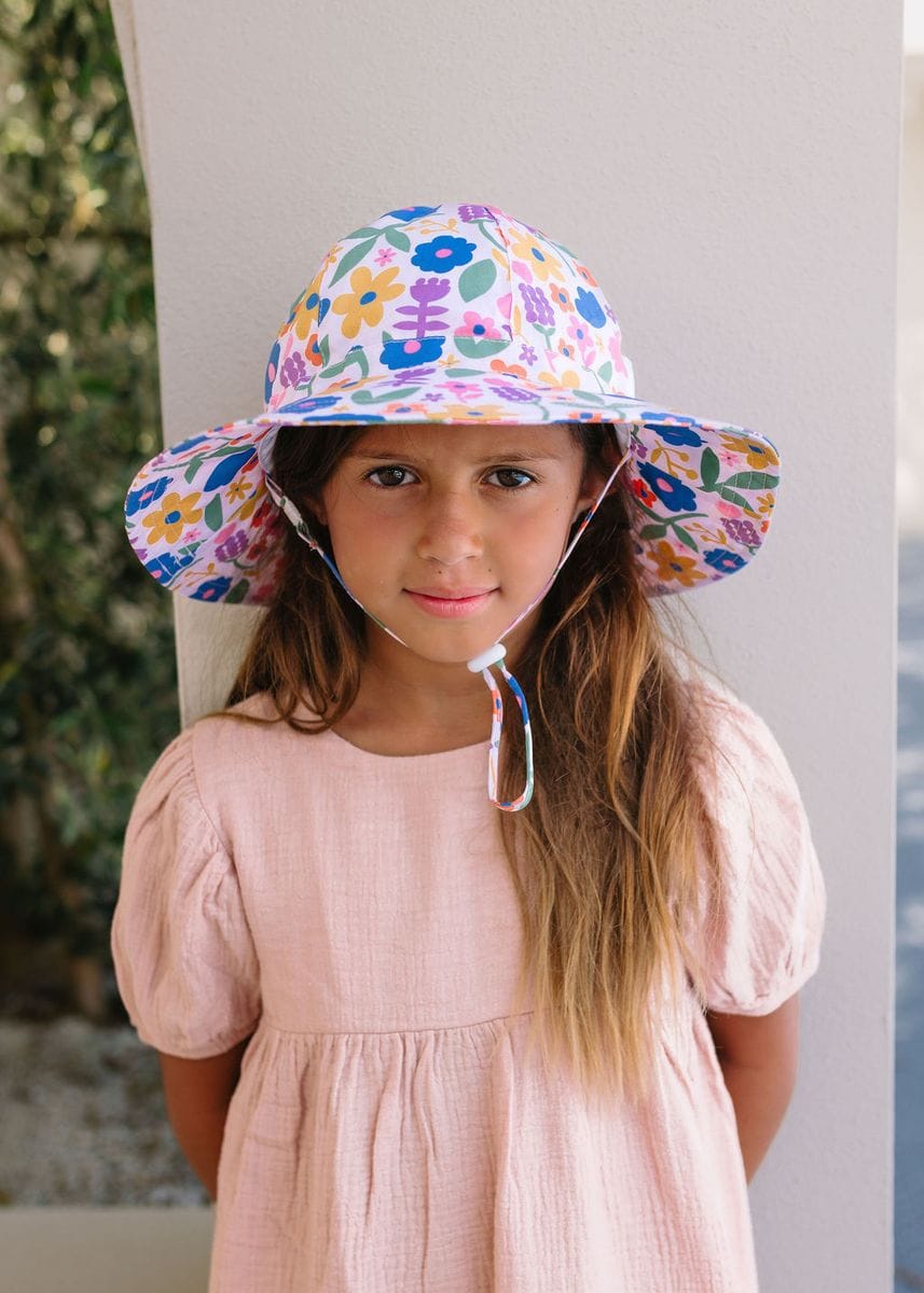 Colorful Petal Pop Wide Brim Sunhat for kids by Acorn Kids, featuring a cheerful floral design and wide brim for sun protection.