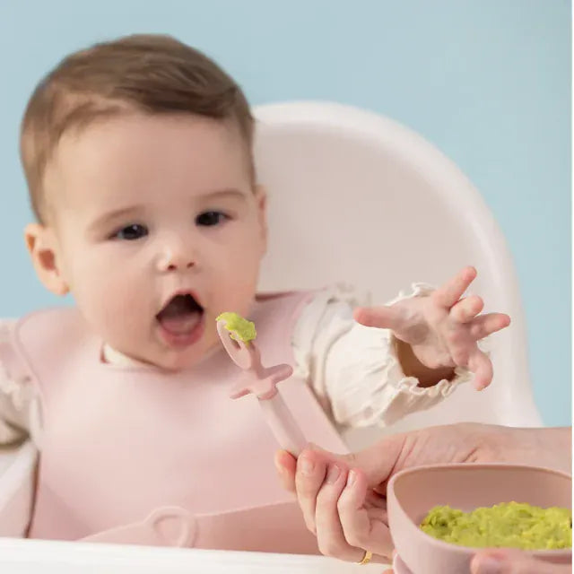 B.Box Weaning Cutlery Trio in blush color, soft plastic utensils designed for feeding and self-feeding for young children.