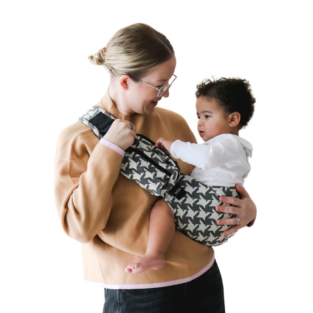 Boba Buddy toddler hip carrier accessory carrier with adjustable straps and padded support for comfortable toddler carrying.