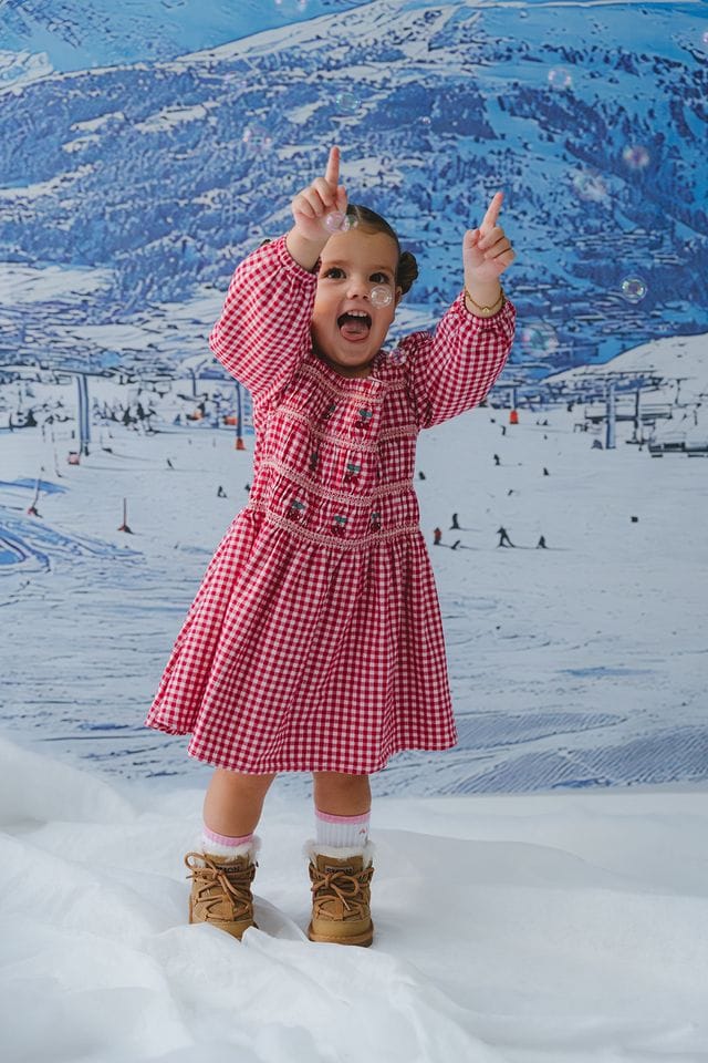 Girls cherry check dress by Huxbaby, featuring a stylish and comfortable design perfect for everyday wear.