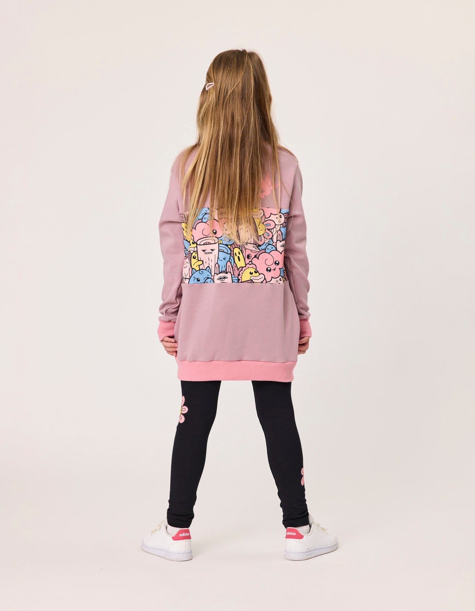 Girls Critters Longline Crew Jumper by Kissed By Radicool featuring a cozy knit design and vibrant critter pattern.