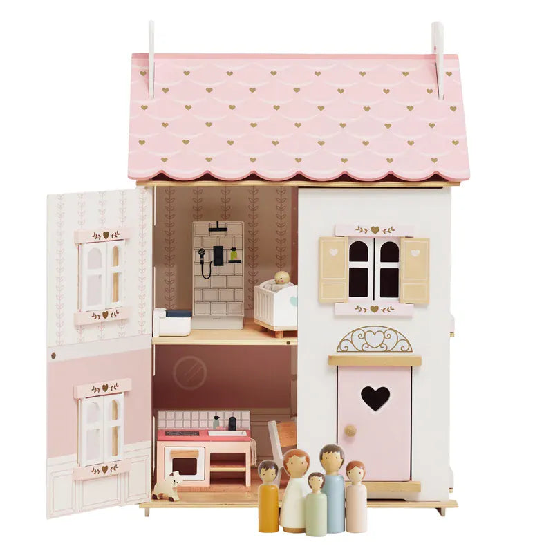 Le Toy Van Roseheart House wooden dollhouse toy in white and pink with detailed windows and doors