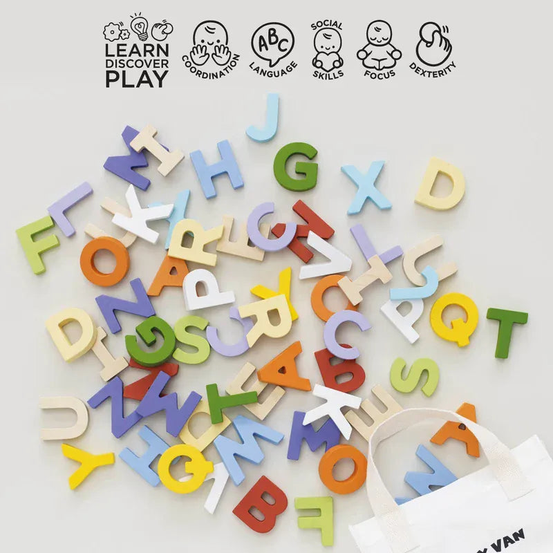 Le Toy Van wooden letters and bag set for children, colorful alphabet pieces in a carry bag