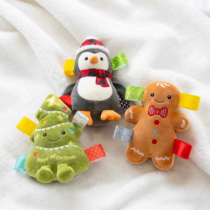 Mary Meyer Taggies Merry Mingle soft rattle toy with colorful textured tags