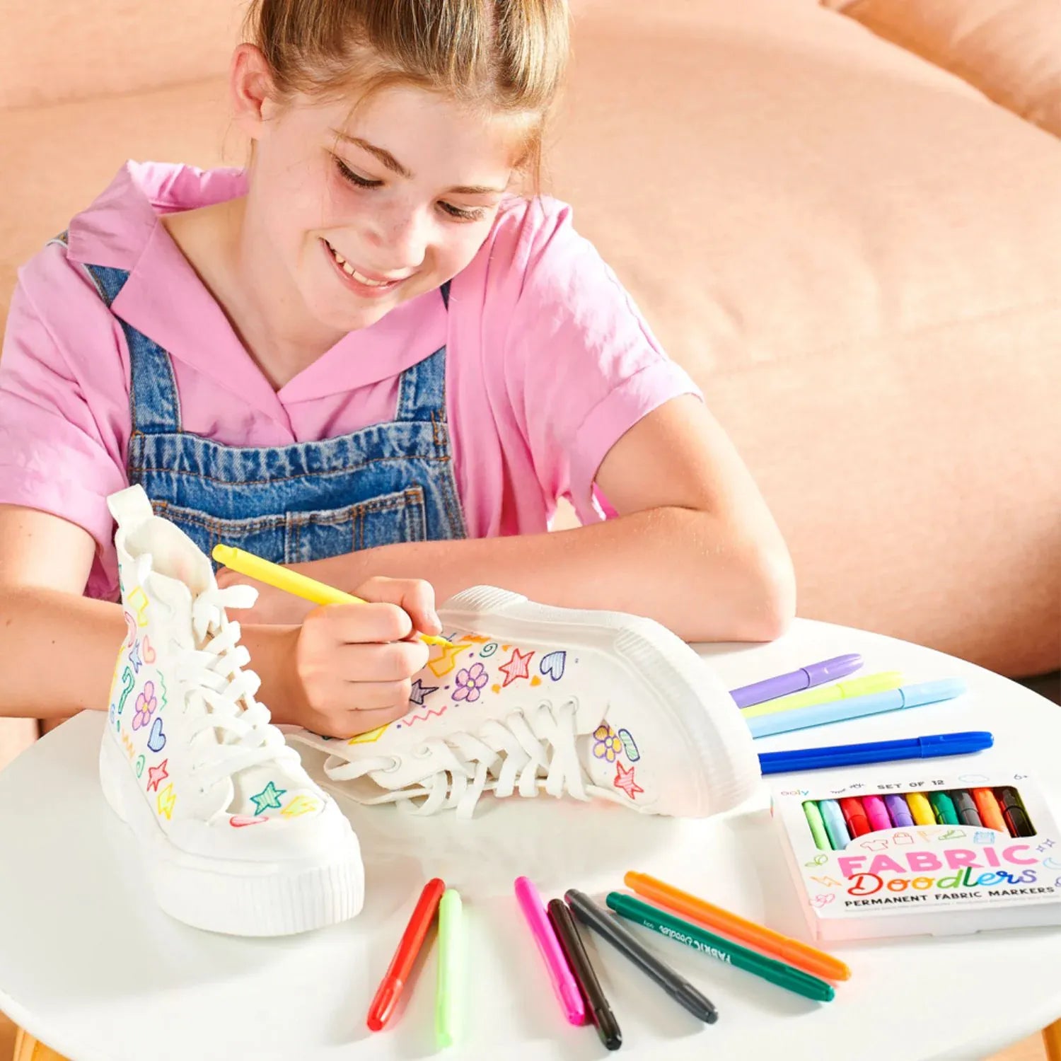 Ooly Fabric Doodlers Markers set of colorful markers designed for fabric and textile art projects.