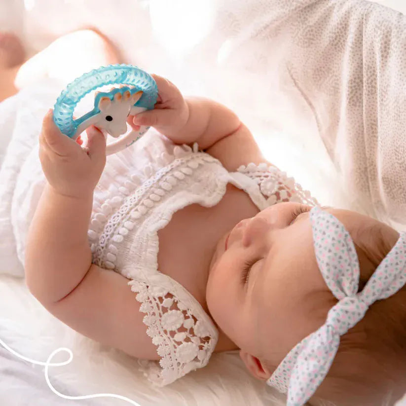 Sophie the Giraffe cooling teething ring for babies, made by Sophie la Giraffe, featuring a soft, colorful giraffe design for soothing gums.