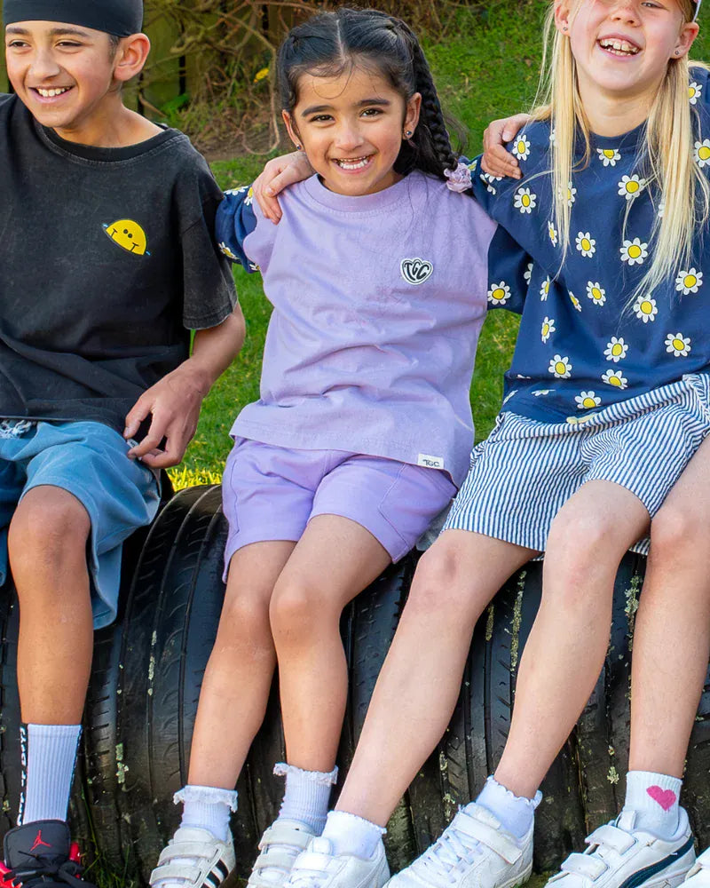 Girls' purple relaxed shorts from The Girl Club, soft and comfortable casual bottoms for everyday wear.