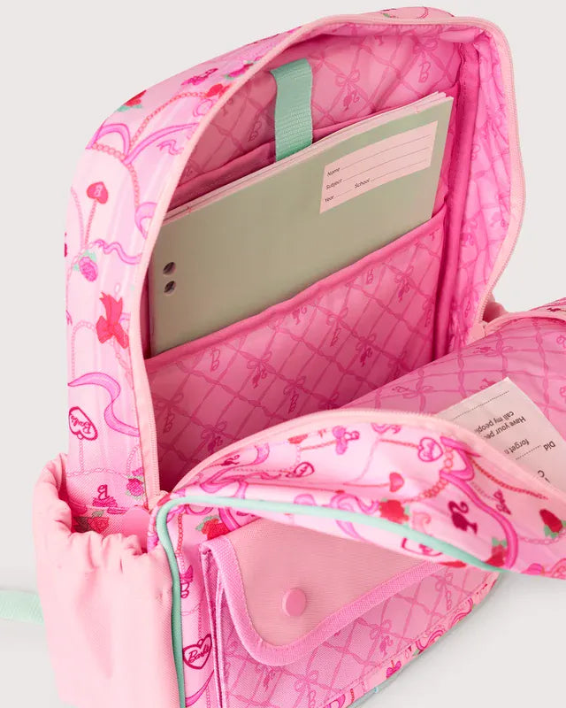 The Somewhere Co. Adventure Backpack in durable fabric with multiple compartments and adjustable straps for outdoor travel.