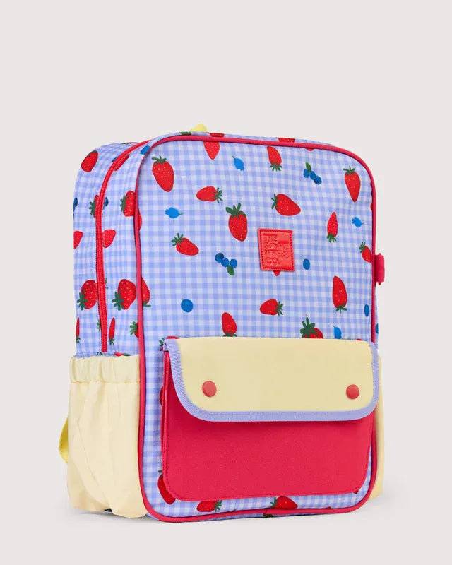 The Somewhere Co. Adventure Backpack in Berry Patch color, featuring durable fabric, adjustable straps, and multiple compartments.