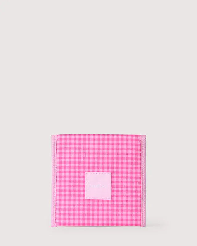 Pink snack bag from The Somewhere Co. with a playful "Tickled Pink" design, perfect for carrying snacks in style.