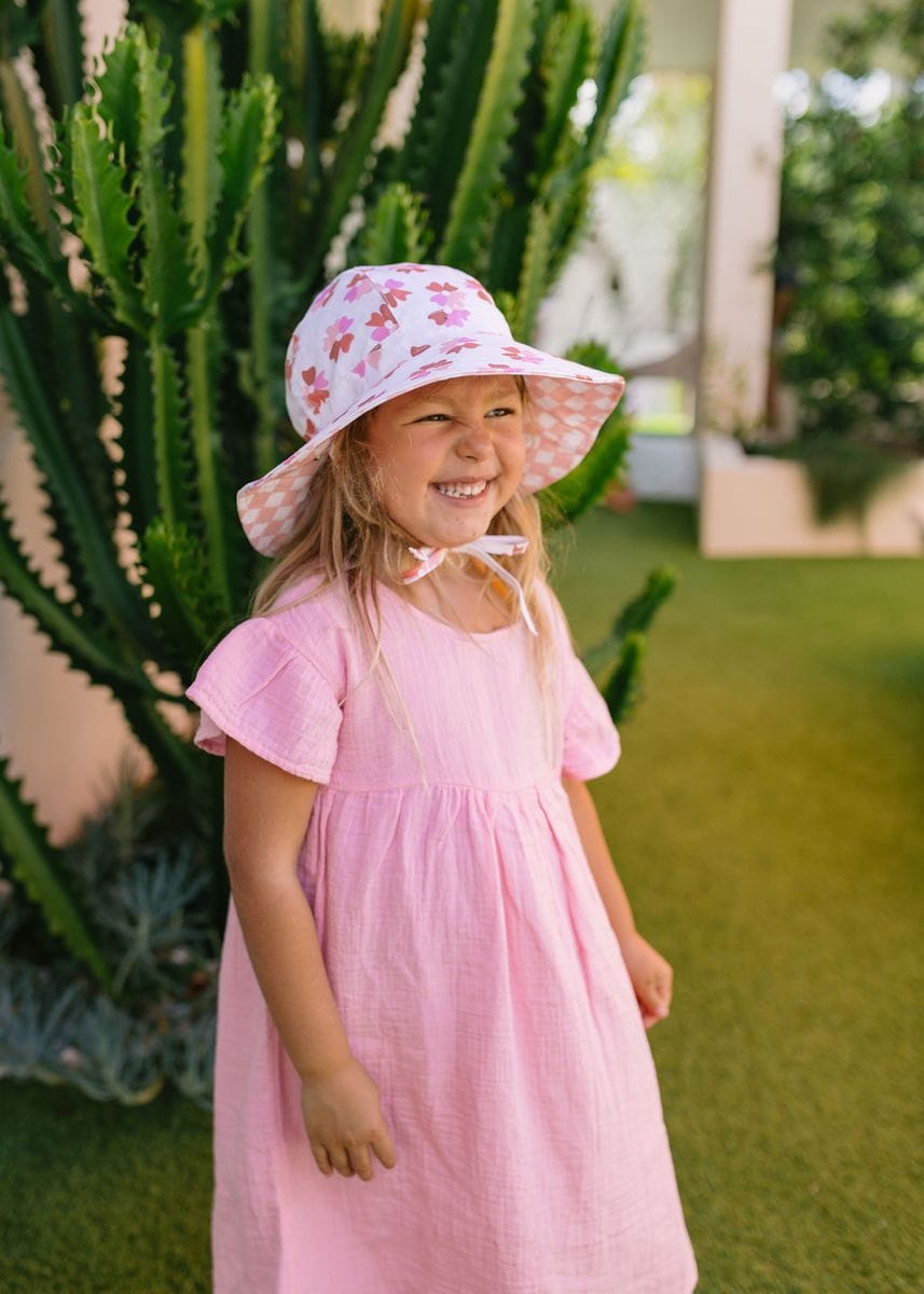 Colorful coral bloom reversible wide brim sunhat for kids by Acorn Kids, perfect for sun protection and stylish outdoor wear.