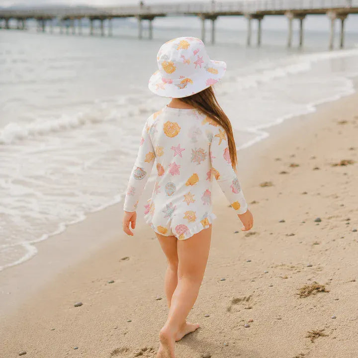 Crywolf Shell long sleeve swimsuit in a neutral beige tone, front view