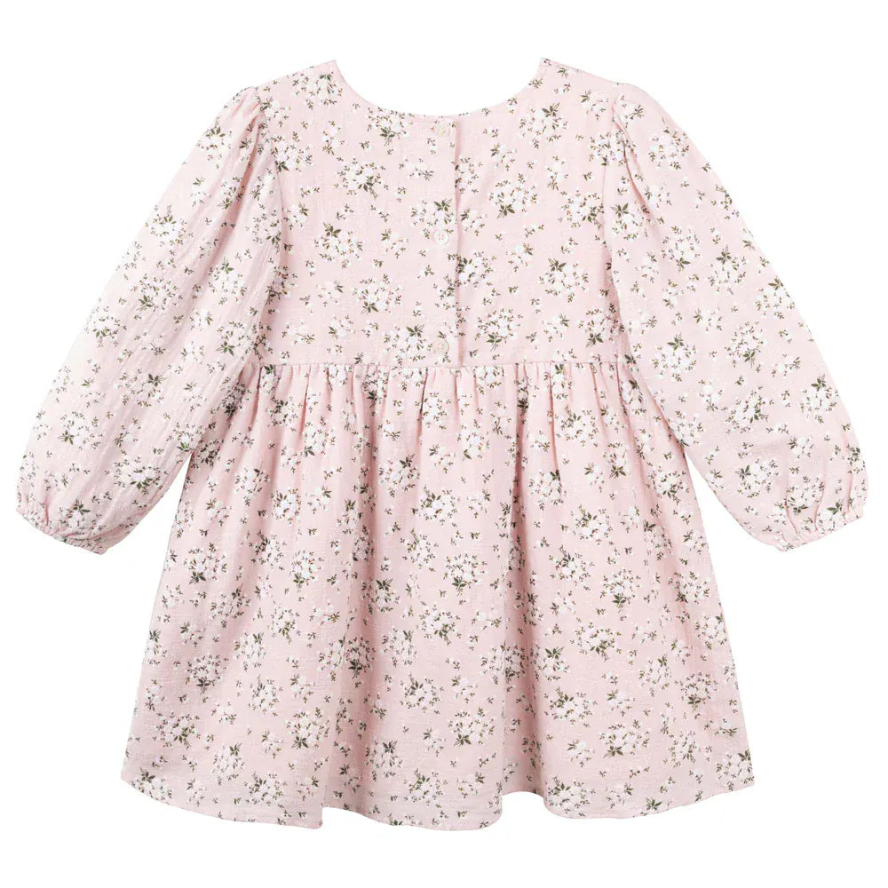Girl's Hazel Floral Dress by Designer Kidz, featuring a charming floral pattern and lightweight fabric, perfect for warm weather.