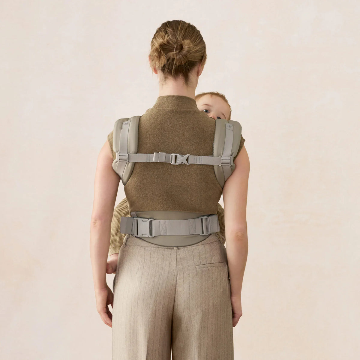 Ergobaby Omni Classic Mesh baby carrier accessory showing adjustable straps and breathable mesh fabric for comfortable carrying.