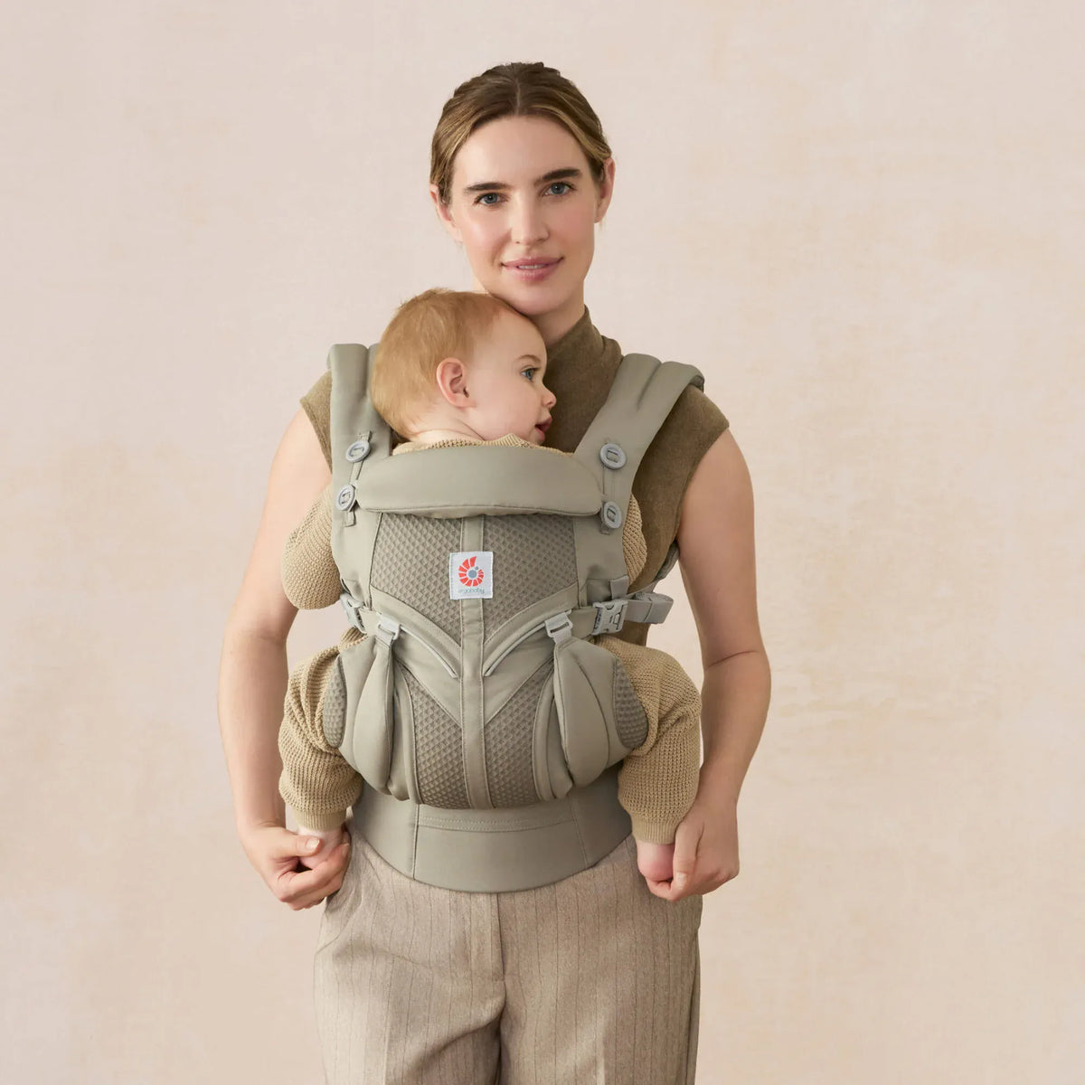 Ergobaby Omni Classic Mesh baby carrier in breathable mesh fabric, designed for ergonomic baby wearing and comfort.