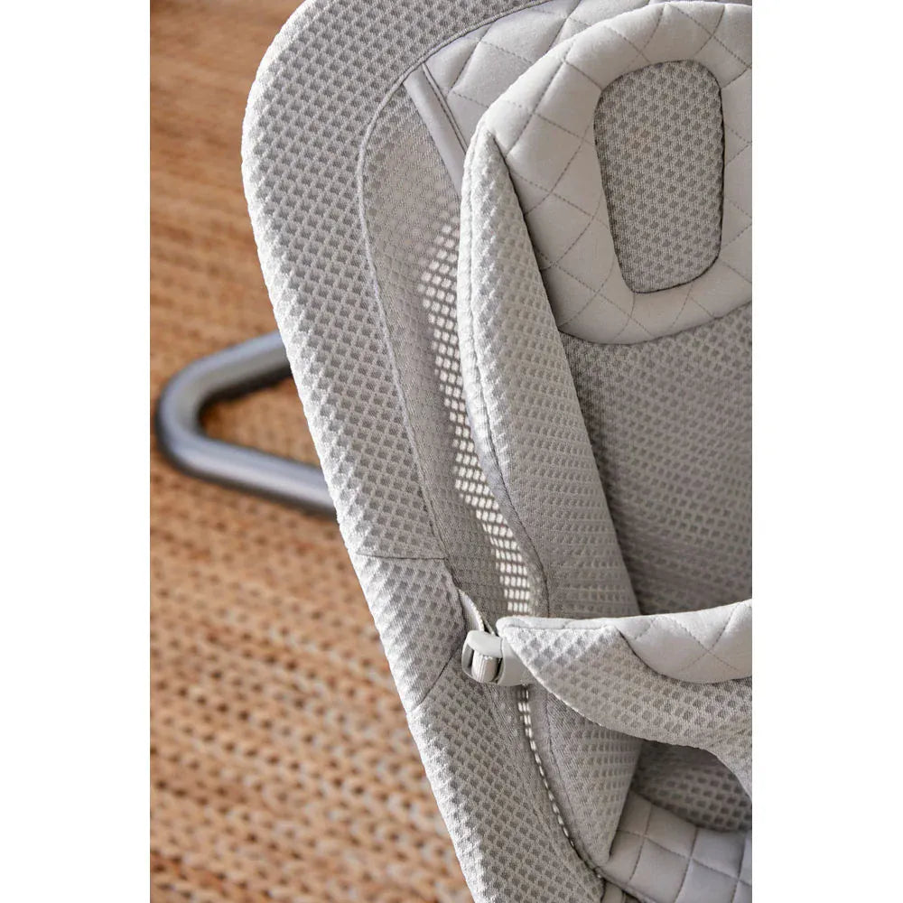 Gray Ergobaby Evolve 3-in-1 Mesh Bouncer nursery furniture with soft fabric and adjustable features for baby comfort.