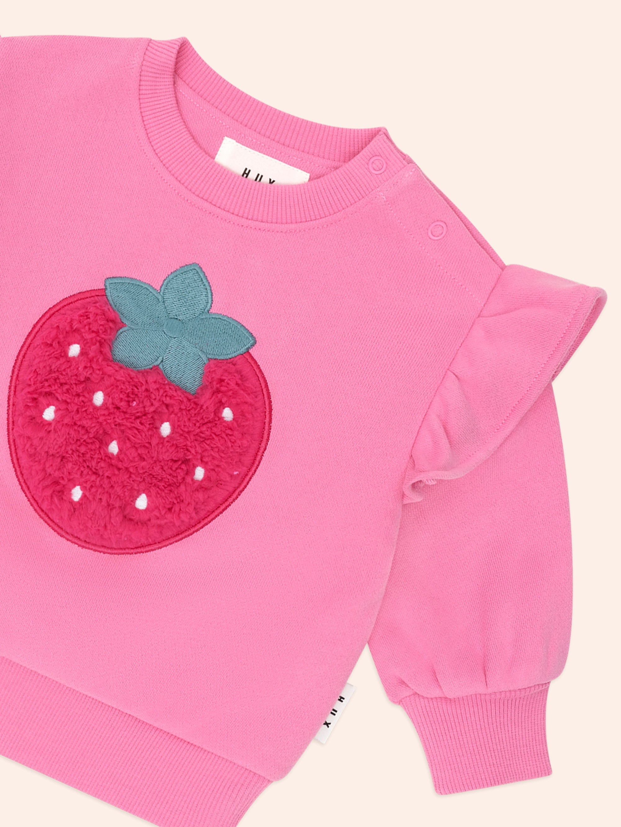 Girls' Very Berry Sweatshirt by Huxbaby, cozy pink jumper with a playful design, perfect for everyday wear.
