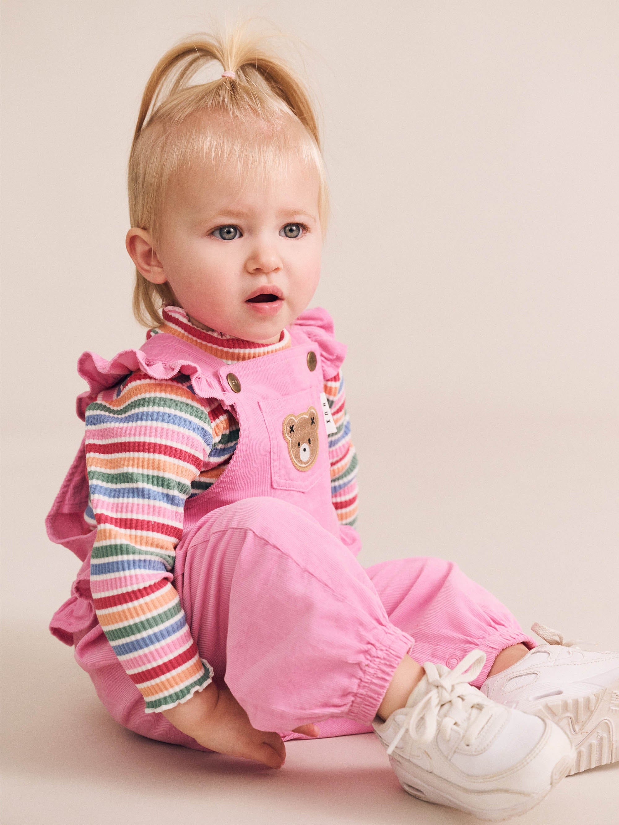 Huxbaby girls' Tutti Frutti Stripe Rib Skivvy with colorful striped pattern and fitted design, made for comfortable wear.