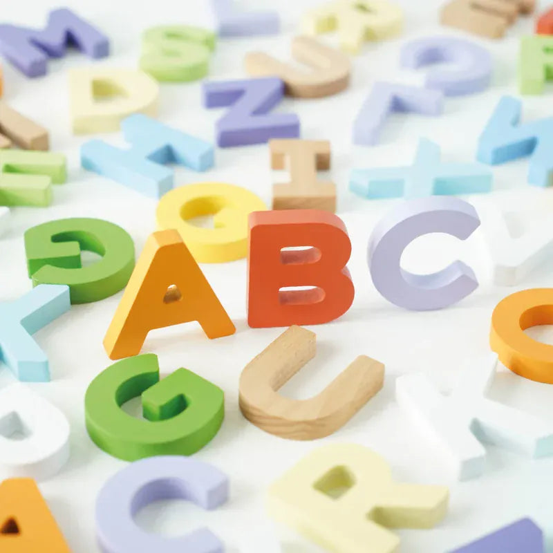 Le Toy Van wooden letters and bag set for children, colorful alphabet toys displayed in a storage bag