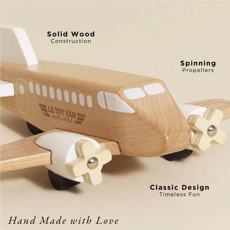 Le Toy Van wooden toy plane with natural wood finish and classic airplane design