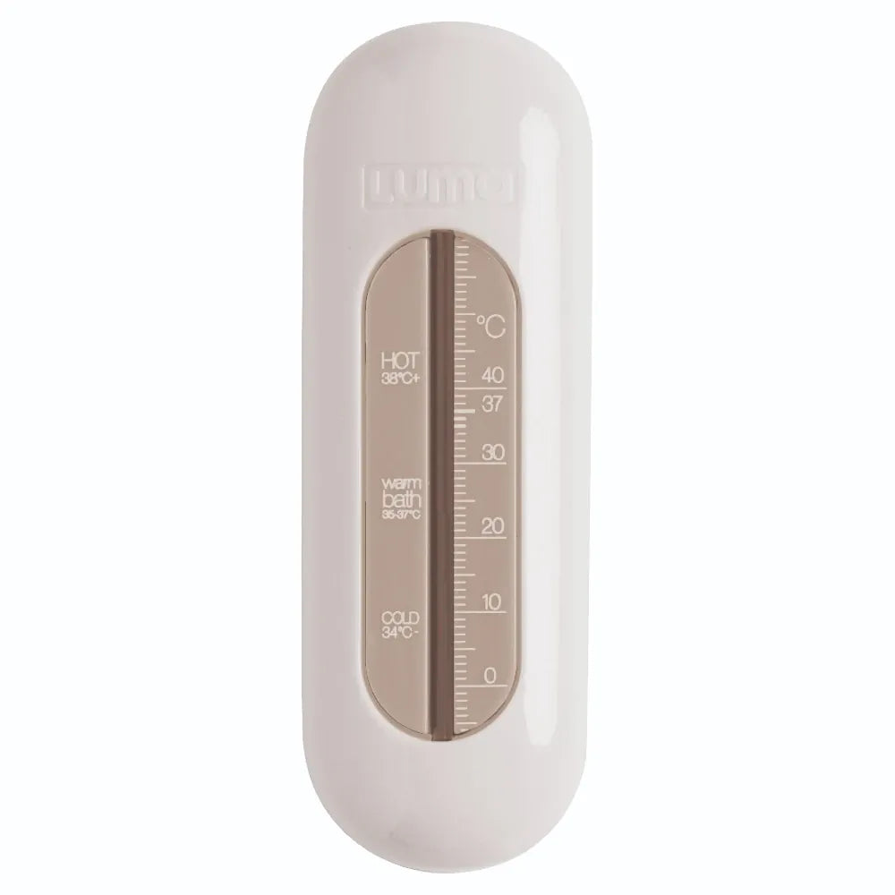 White LUMA baby care bath thermometer showing digital display of water temperature for safe bathing.