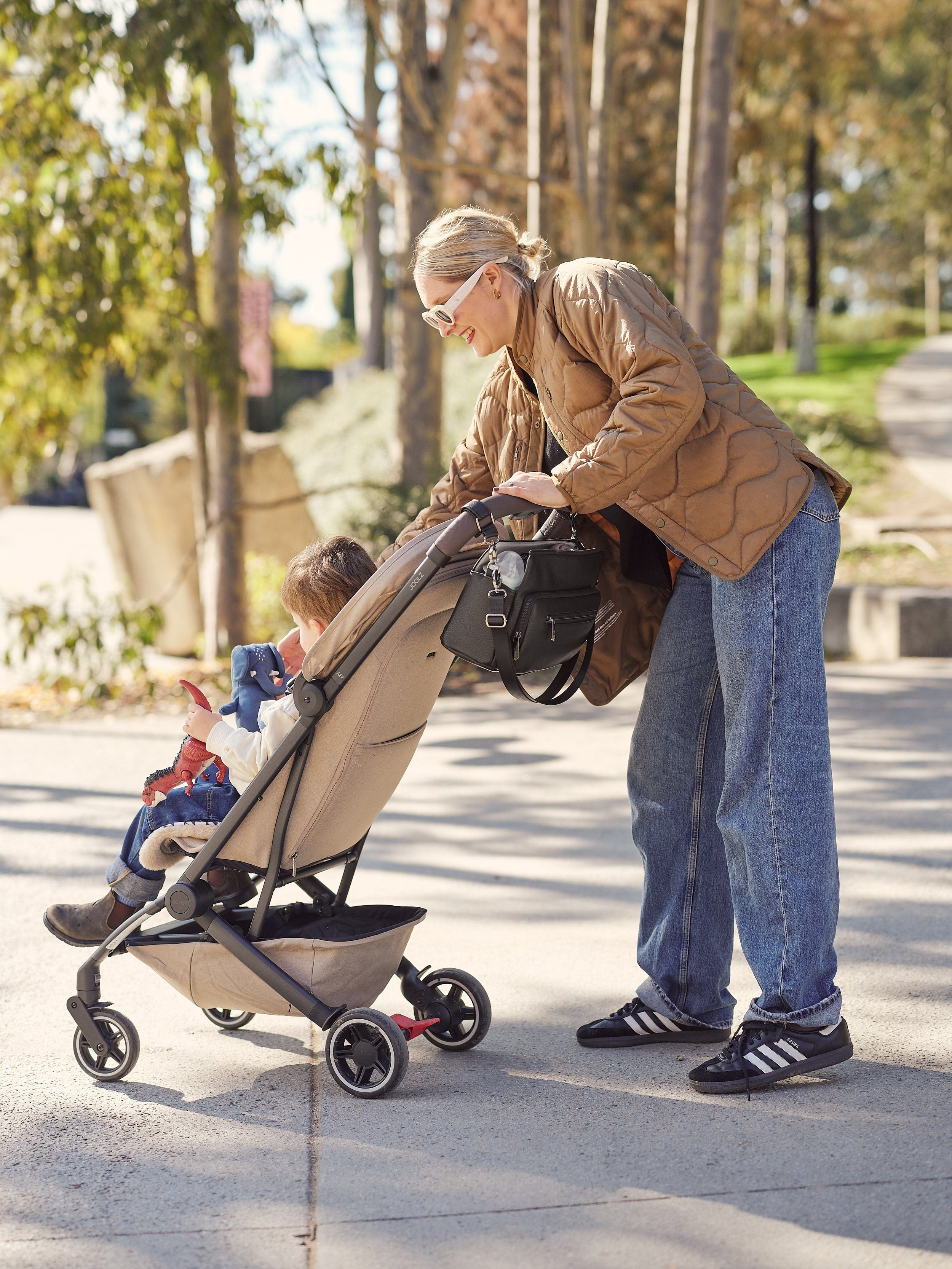 OiOi Baby Accessory Multitasker Pram Caddy - Black Vegan Leather