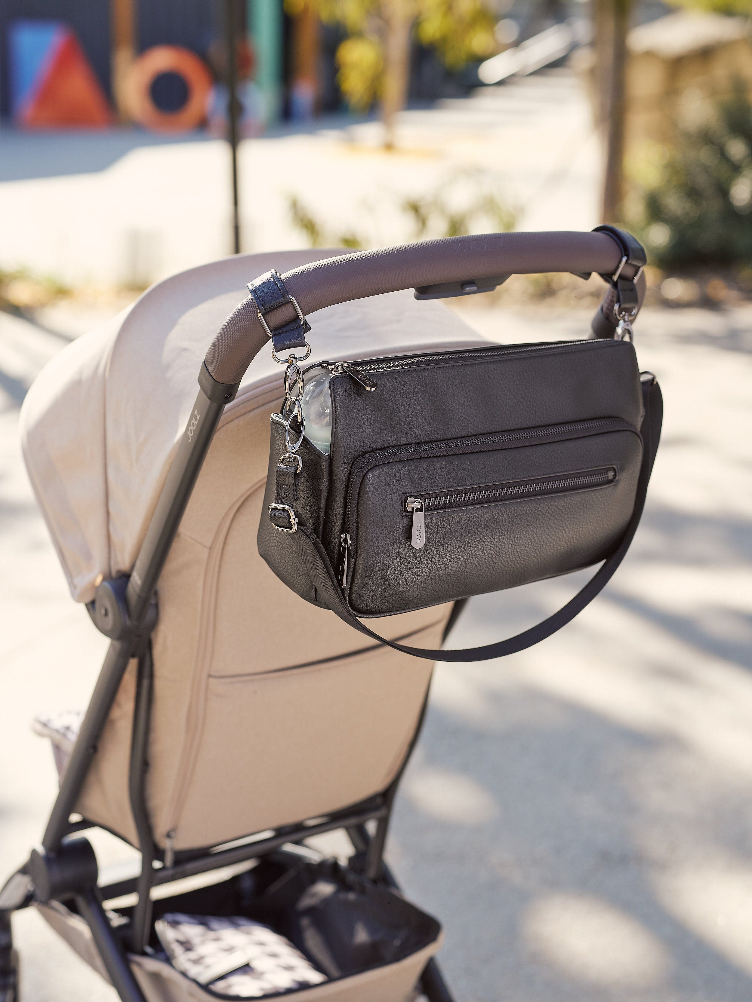 OiOi Baby Accessory Multitasker Pram Caddy - Black Vegan Leather