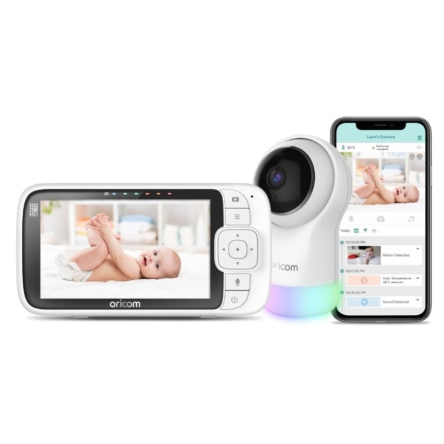 Oricom 5-inch Smart HD Nursery Pal Glow+ baby monitor showing a screen with live video feed and control buttons in a nursery setting.