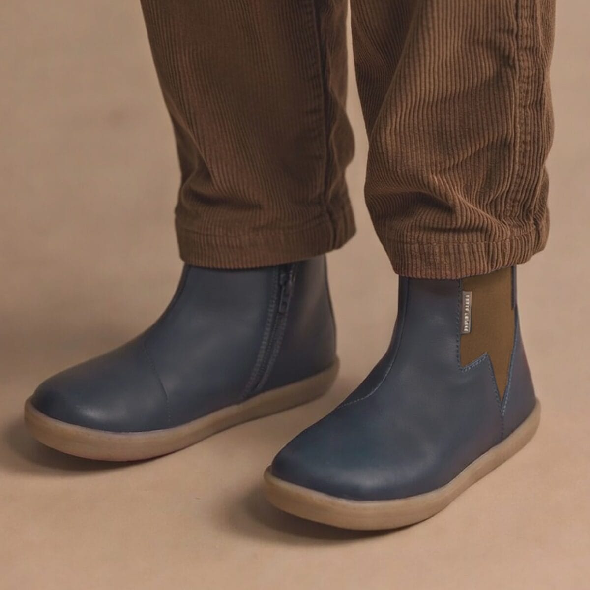 Pretty Brave Boys Electric Boot in Indigo, showcasing durable, stylish children's shoes with Velcro straps and rugged soles.