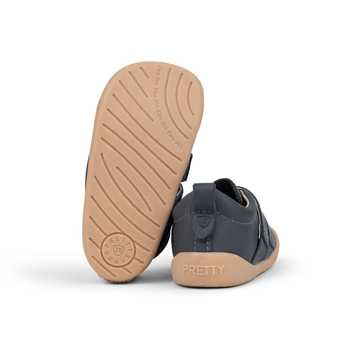Pretty Brave TOTO Indigo boys' shoes, stylish navy sneakers with white accents, featuring comfortable laces and durable soles.