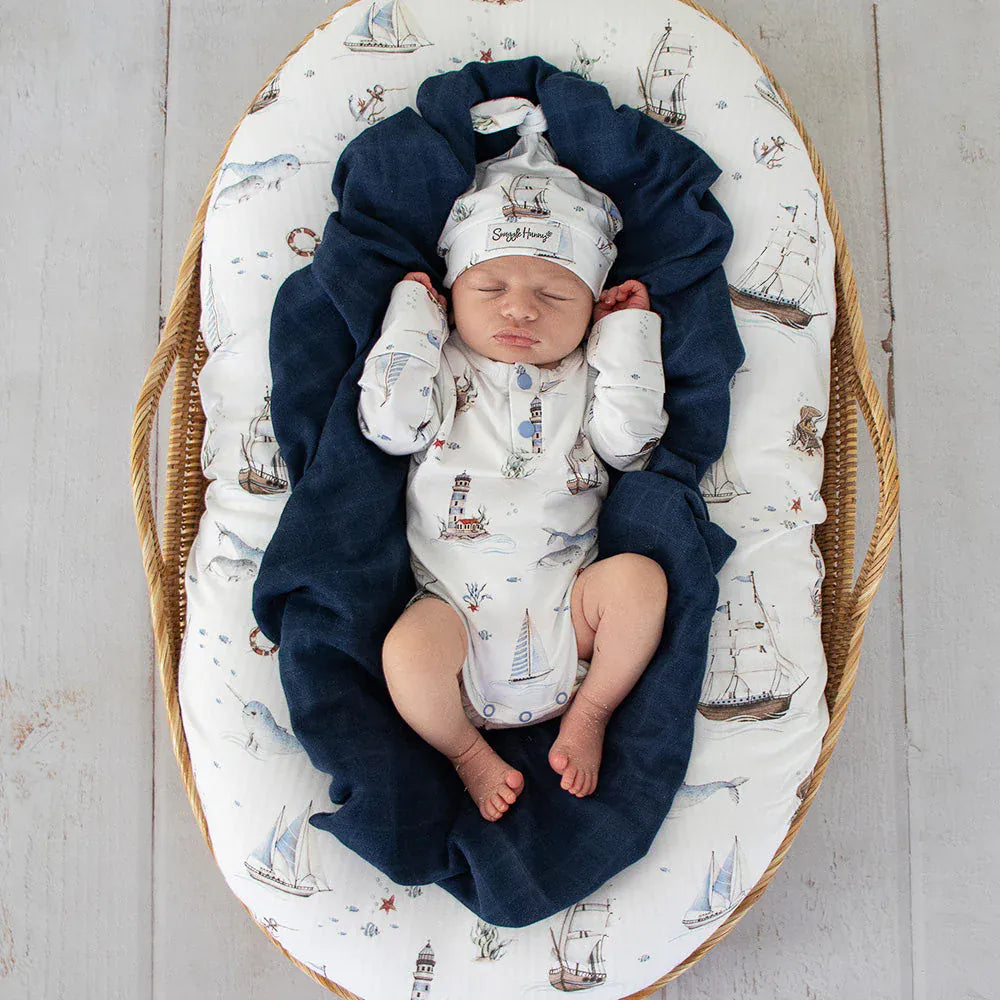 Snuggle Hunny Kids boys long sleeve Set Sail organic bodysuit, soft cotton onesie with nautical print, suitable for infants.