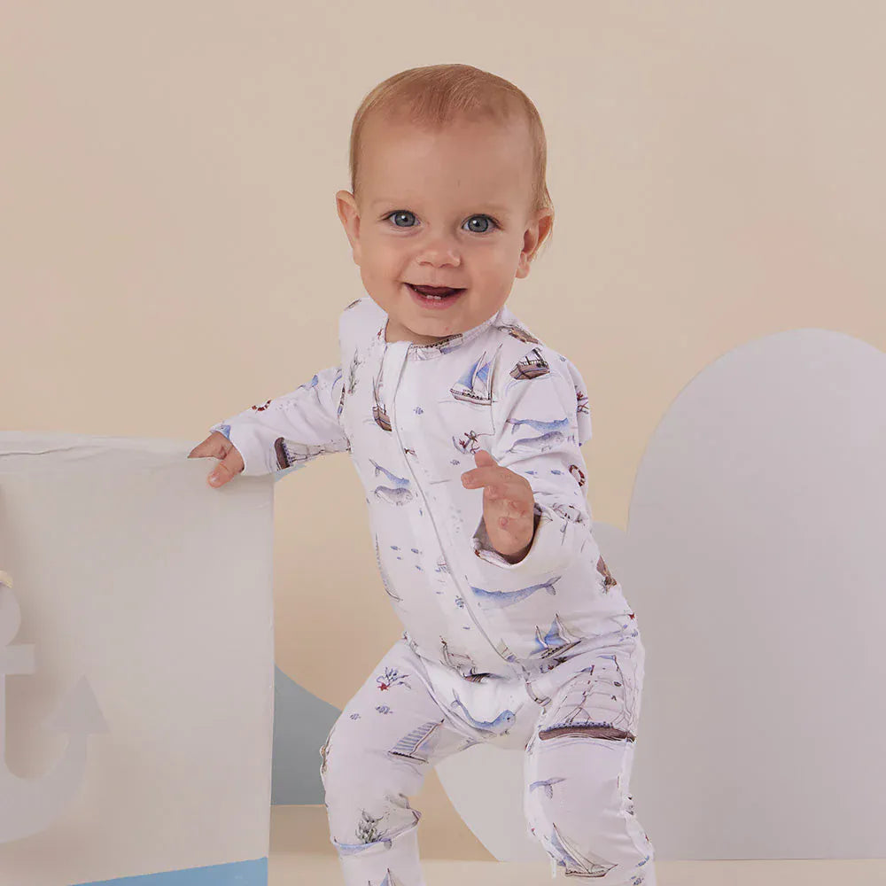 Girls Snuggle Hunny Kids Set Sail Organic Snugglesuit convertible romper, soft fabric, featuring sailboat print and cozy design.