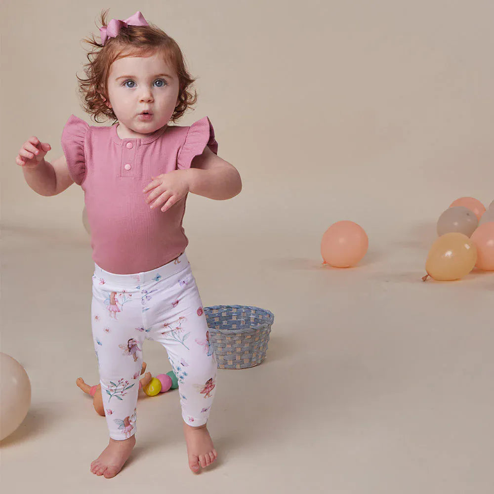 Girls' Fairy Garden organic leggings by Snuggle Hunny Kids, featuring colorful fairy and floral print on soft, comfortable fabric.