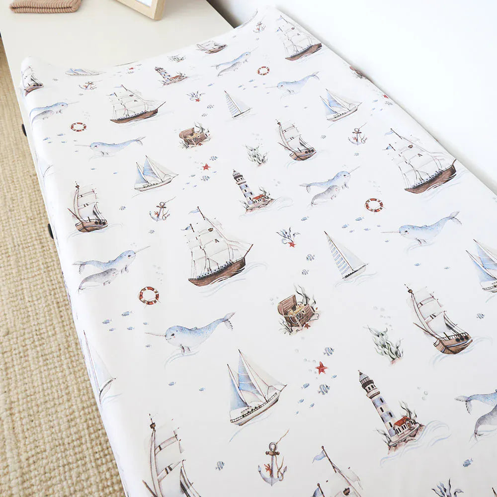 Snuggle Hunny Kids organic linen bassinet sheet with sail pattern, designed as a change pad cover for baby bassinet.