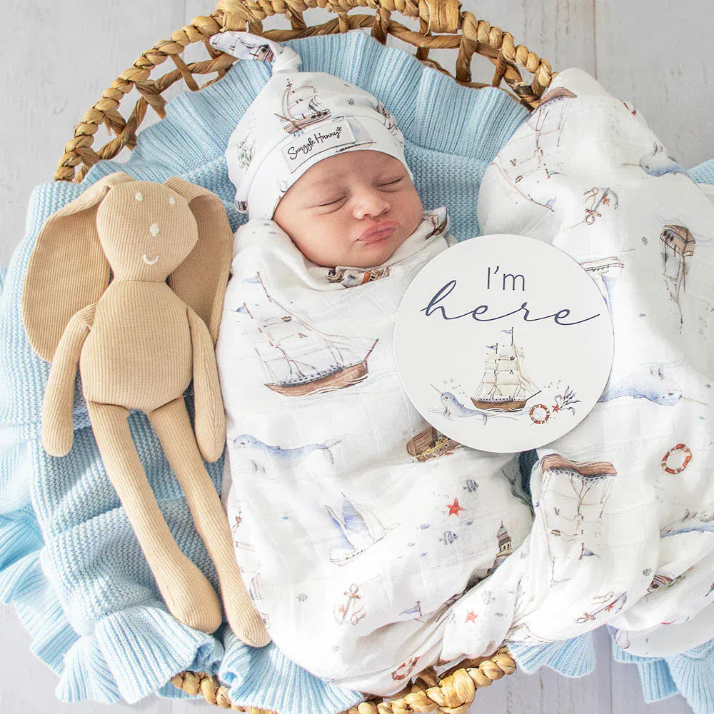 Snuggle Hunny Kids Set Sail organic muslin linen sheets display soft, breathable fabric with nautical print for baby bedding.