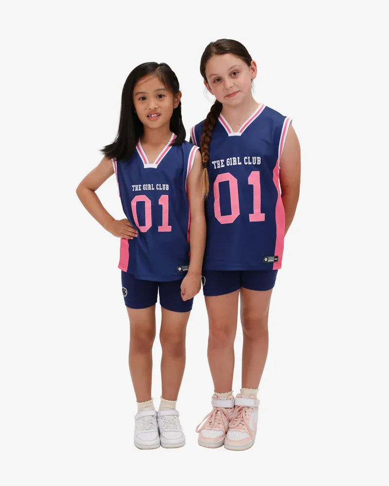 Girls' basketball tank top by The Girl Club, featuring sporty design and comfortable fit for active girls aged 6-7 years.
