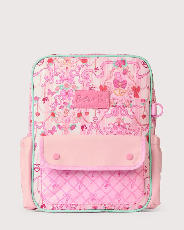 The Somewhere Co. Adventure Backpack featuring a colorful Barbie Rococo design, made of durable fabric with adjustable straps.
