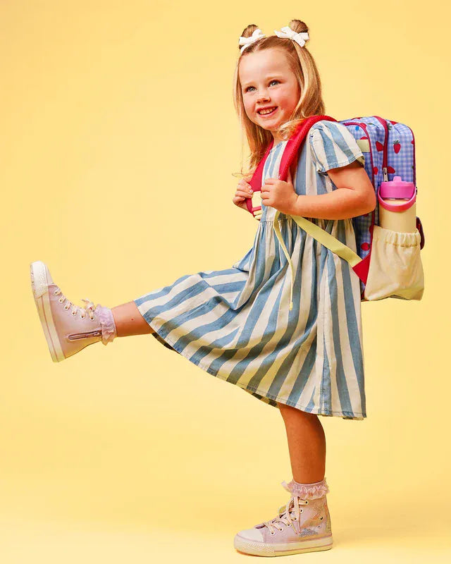 The Somewhere Co. Adventure Backpack in Berry Patch design, showing a stylish bag with adjustable straps and front pocket.