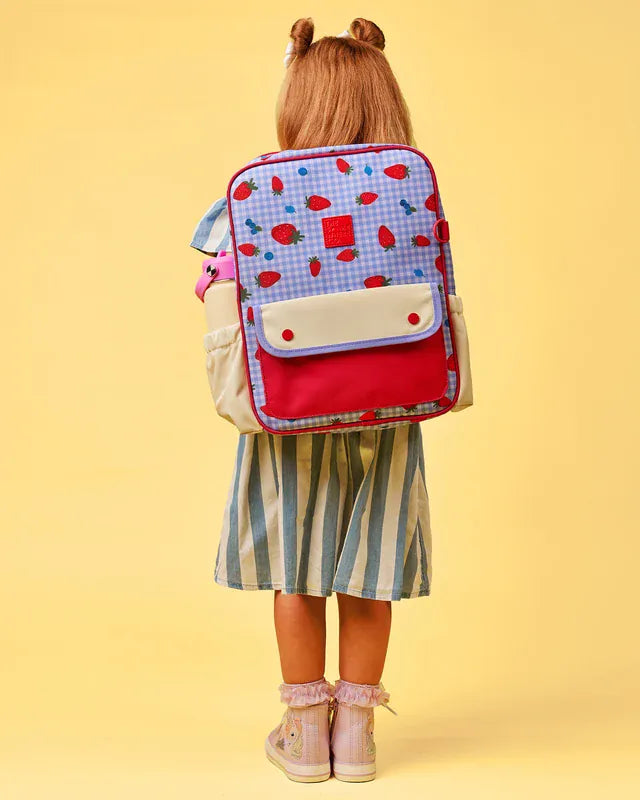 The Somewhere Co. Adventure Backpack in Berry Patch featuring adjustable straps, front pocket, and spacious main compartment.