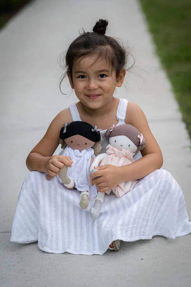 Soft toy doll from Tikiri Collection named Angelina with light skin, designed for children, featuring realistic features and durable fabric.