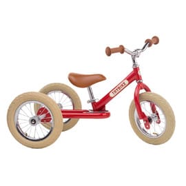 Trybike Vintage Red ride-on toy for kids, featuring a classic red design and sturdy wooden construction for outdoor play.