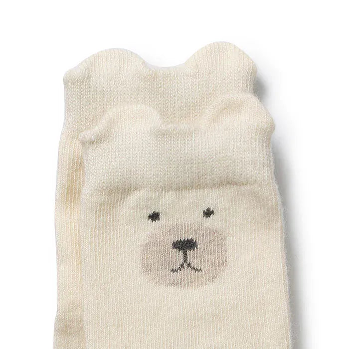 Girls organic baby socks in a 4-pack, soft cotton accessory socks by Wilson & Frenchy, featuring colorful patterns and comfy fit.