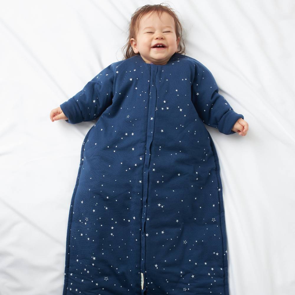 Woolbabe Linen Duvet Front Zip Sleeping Bag with Sleeves in Tekapo Stars pattern, designed for infants and toddlers.