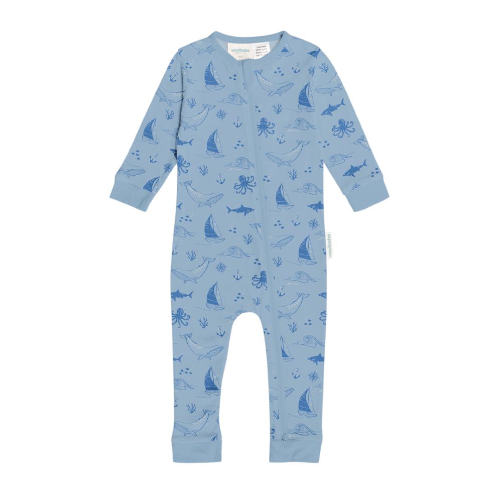 Unisex Woolbabe Merino and organic cotton PJ suit in Glacier Sail Away design for babies aged 3-6 months, comfortable sleepwear.